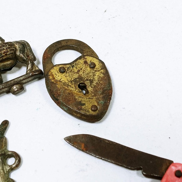 Vtg Cracker Jack Gumball Prize Metal Charms Hermonica Elsie Cow Tomahawk Teeth - Picture 7 of 9